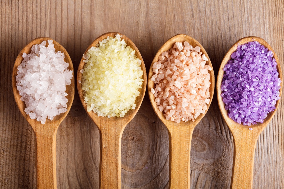 wooden spoons with colored salts