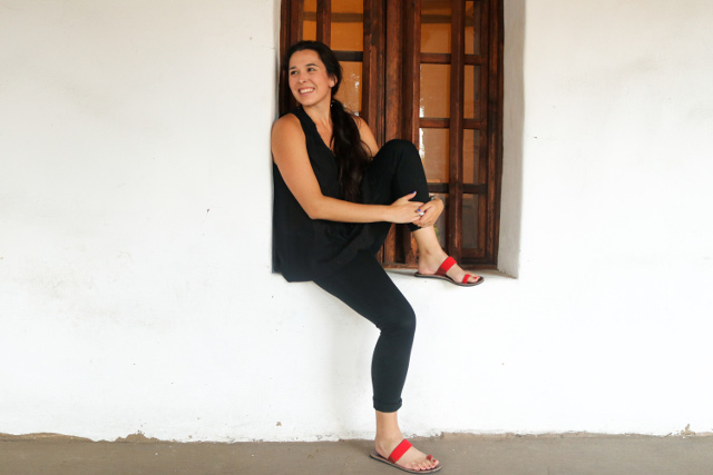 woman sitting in window