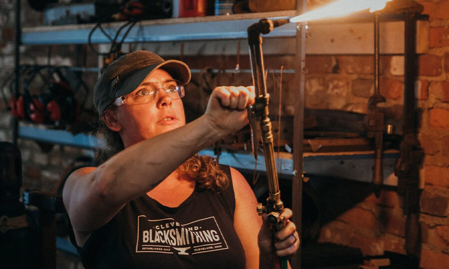 Brooke working at Cleveland blacksmithing