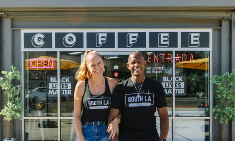 South LA Cafe founders standing in front of one of their locations