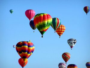 15 hot air ballons in the sky