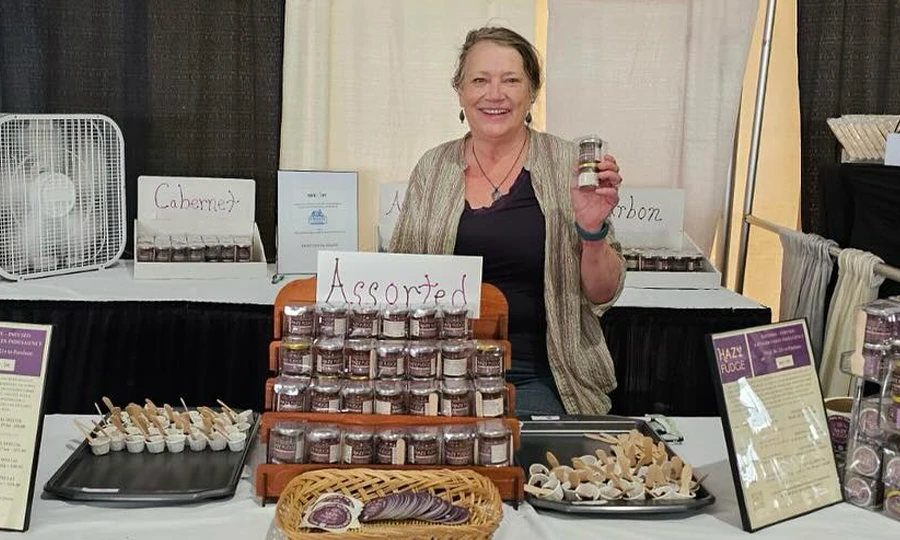 Carol selling her fudge at a festival